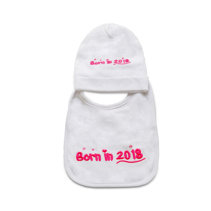 A cute Born In 2018 baby bib and beanie pink gift set. 
