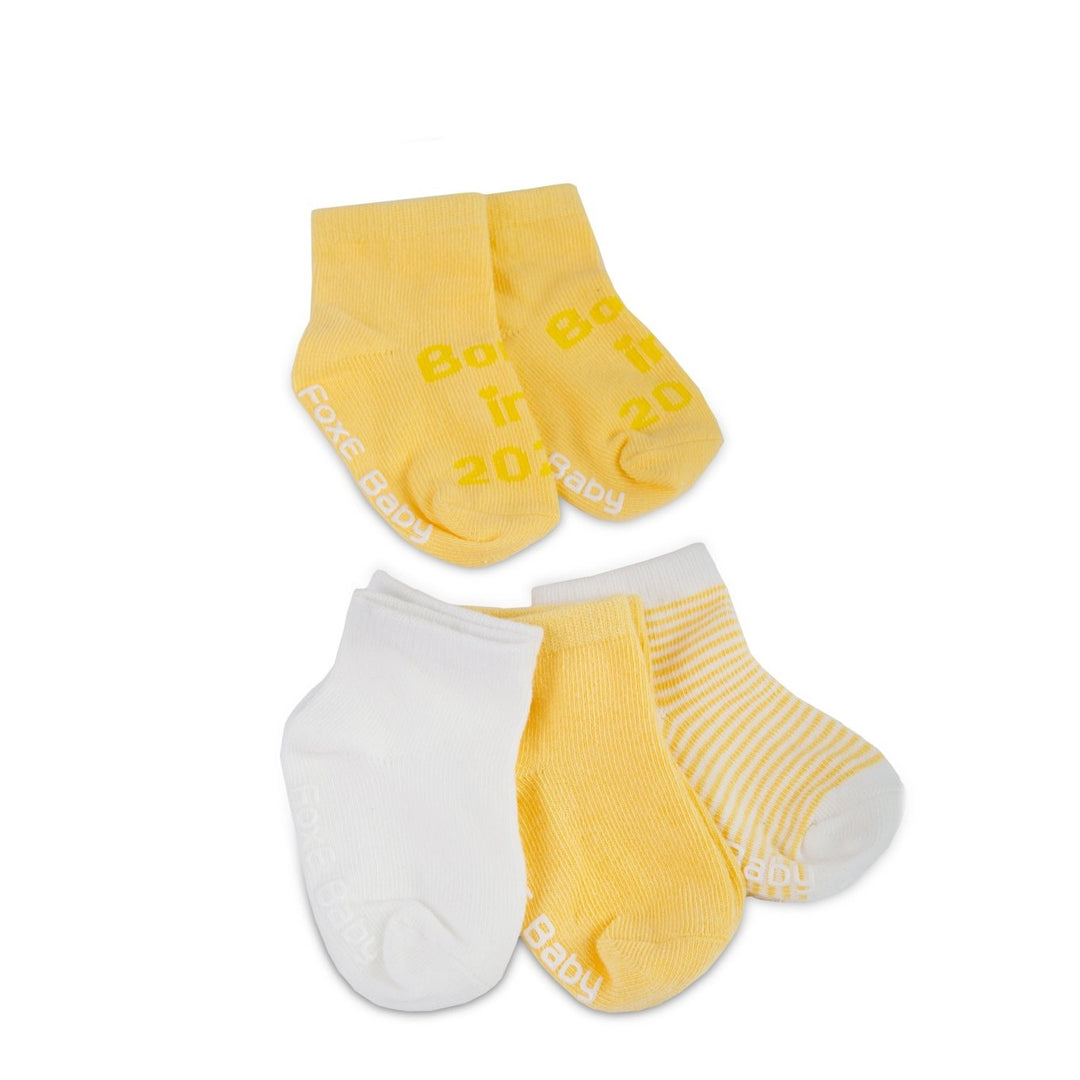 Born In 2023, a yellow 4 pack of soft modal cotton socks - FoxE Baby