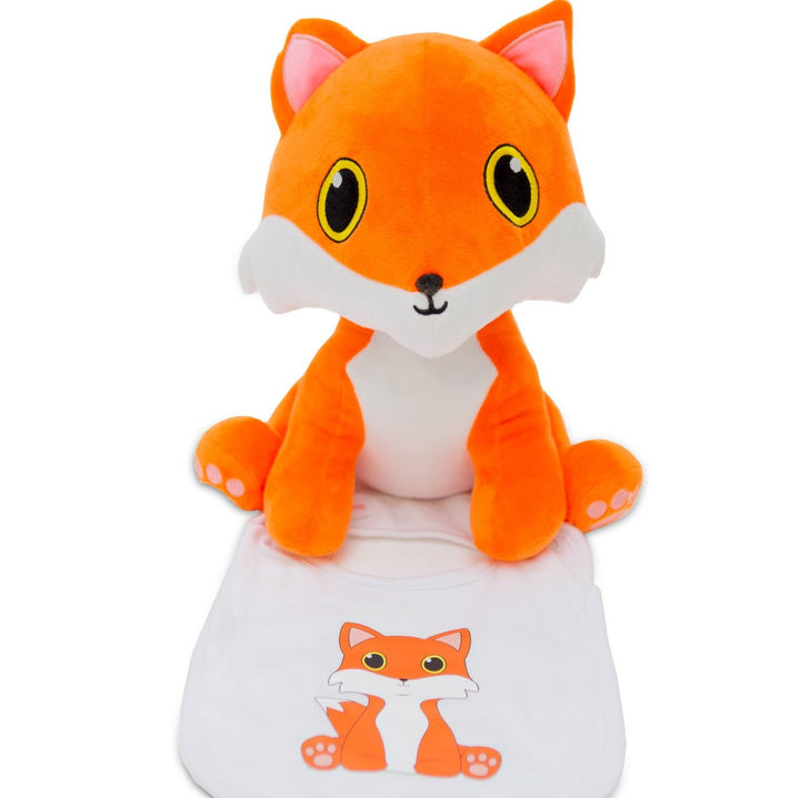 A soft toy fox sitting on a fox baby bib.